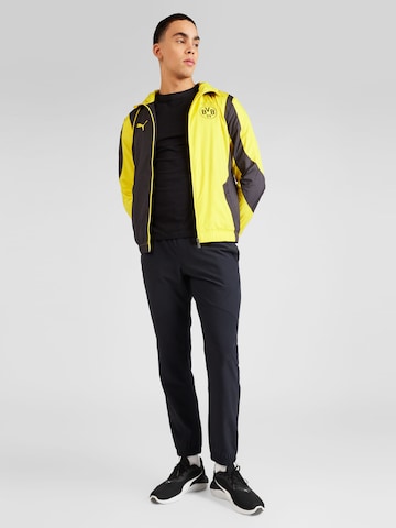 UNDER ARMOUR Tapered Sportbroek in Zwart