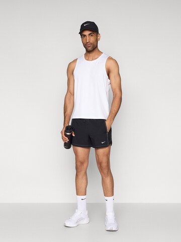 NIKE Normalny krój Spodnie sportowe w kolorze czarny