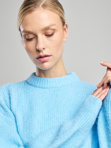 Pull-over America Today en bleu