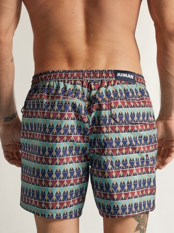 IUMAN Intimissimi Board Shorts in Red