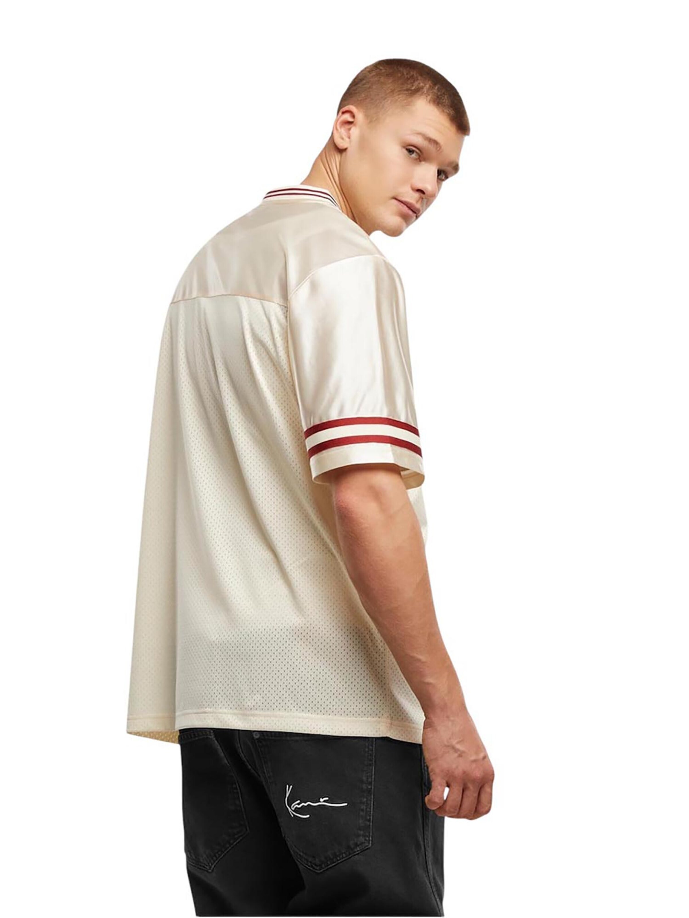 Karl Kani Koszulka 'Varsity' w kolorze beżowy