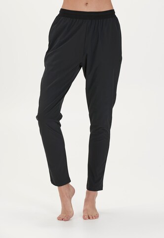 Athlecia Regular Workout Pants 'GOLINA W' in Black: front