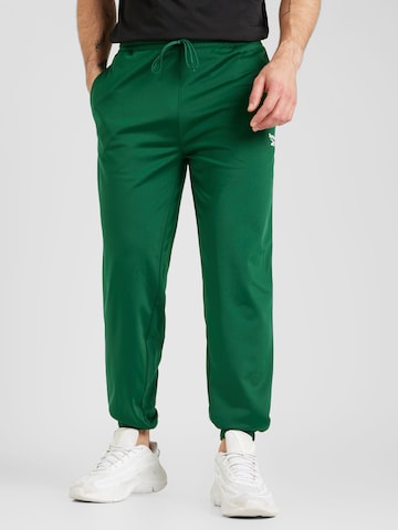 Regular Pantaloni sport de la Reebok pe verde: față