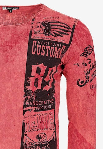 Rusty Neal Langarmshirt mit plakativem Front & Back Print in Rot