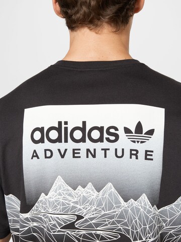 ADIDAS ORIGINALS Paita 'Adventure Mountain Back' värissä musta