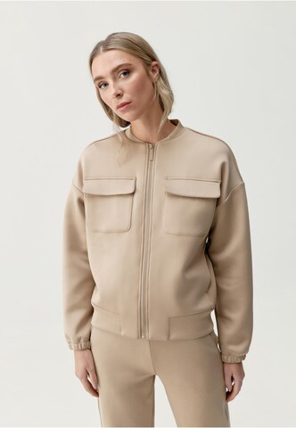 Veste mi-saison 'Graft' Born Living Yoga en beige : devant
