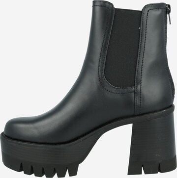 Madden Girl Chelsea Boots in Black