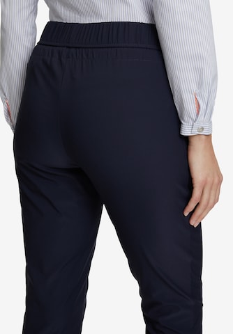 Cartoon Slimfit Hose in Blau