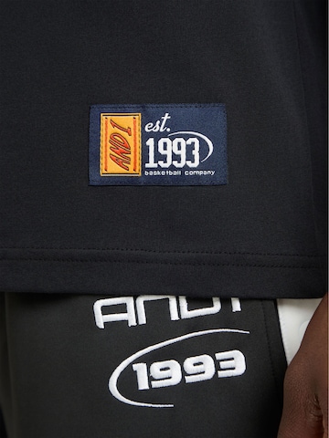AND1 T-shirt 'Auf Dem Geld' i svart