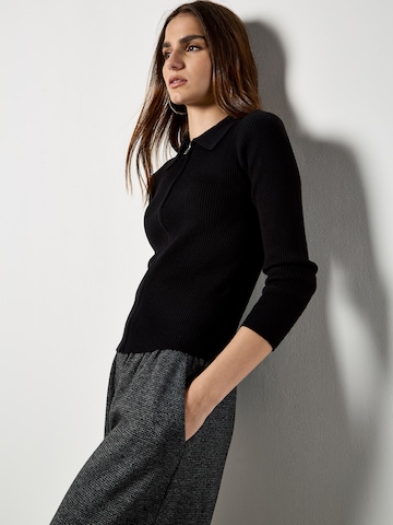 Cardigan Apricot en noir