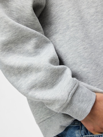 Sweat-shirt 'PCChilli' PIECES en gris