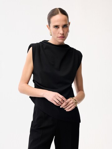 adl Bluse‌‌‌‌‌ in Schwarz