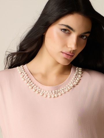 Haut oltre en rose
