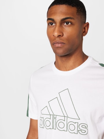 ADIDAS SPORTSWEAR - Camisa funcionais 'Future Icons Embroidered Badge Of Sport' em branco