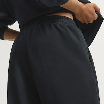 ADIDAS SPORTSWEAR - Loosefit Calças de desporto em preto