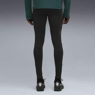 PUMA Skinny Sports trousers in Black