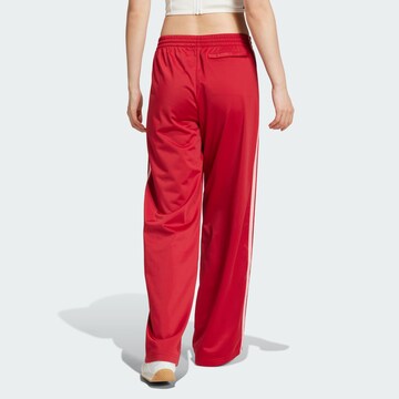 ADIDAS ORIGINALS Loose fit Trousers 'Firebird' in Red