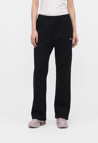 Nike Sportswear Свободный крой Штаны 'STDO FLC' в Черный: спереди