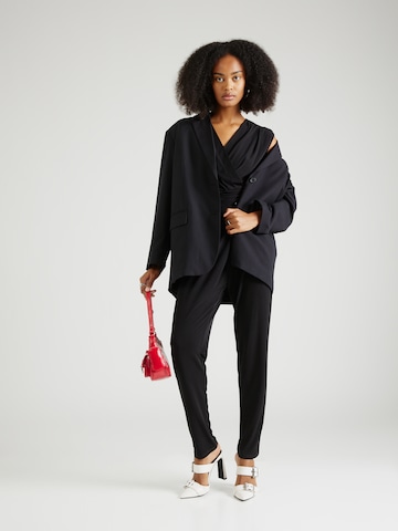 Tuta jumpsuit di ESPRIT in nero