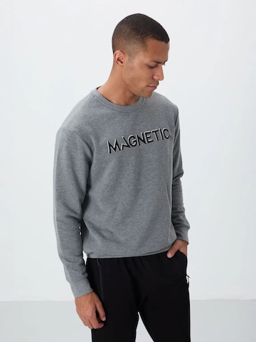 Sweat-shirt Tommy Life en gris