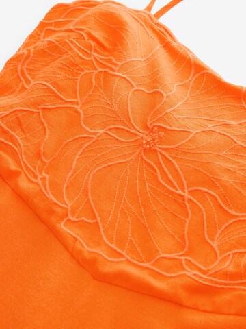 Tuta jumpsuit 'Cornelli' di Next in arancione