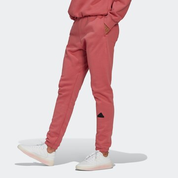 regular Pantaloni sportivi di ADIDAS SPORTSWEAR in rosso