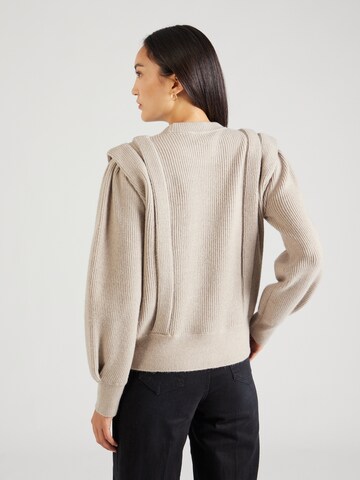DKNY Sweter w kolorze beżowy