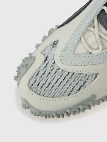 PUMA Veterlaarsjes 'Mostro' in Grijs