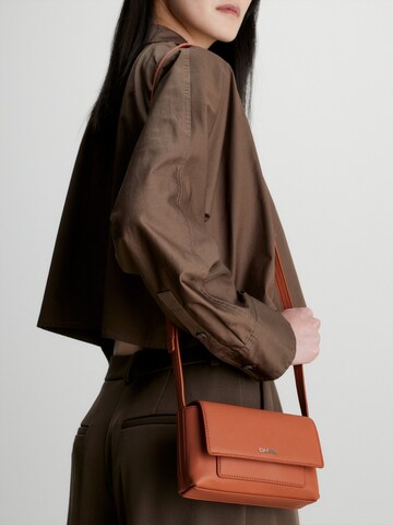 Calvin Klein Crossbody Bag 'Must' in Orange