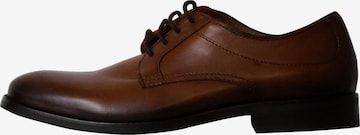 Chaussure à lacets REDSKINS en marron : devant