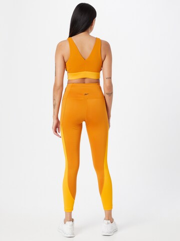 Reebok Skinny Sporthose in Orange