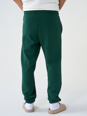 ABOUT YOU x Dardan Loose fit Pants 'Marlo' in Green
