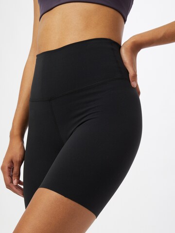 NIKE Skinny Sportbroek in Zwart