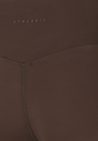 Athlecia Skinny Sports trousers 'Emarri' in Brown