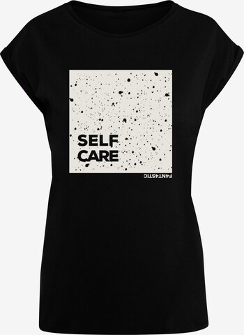 F4NT4STIC Shirt 'Self Care' in Zwart: voorkant