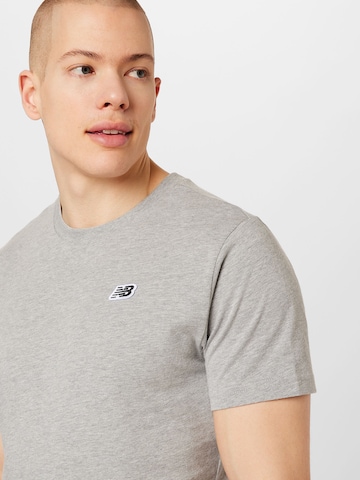 T-Shirt fonctionnel new balance en gris