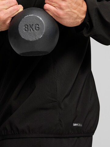 PUMA - Chaqueta de chándal 'Tad Tech' en negro