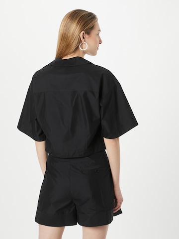 3.1 Phillip Lim - Blusa en negro