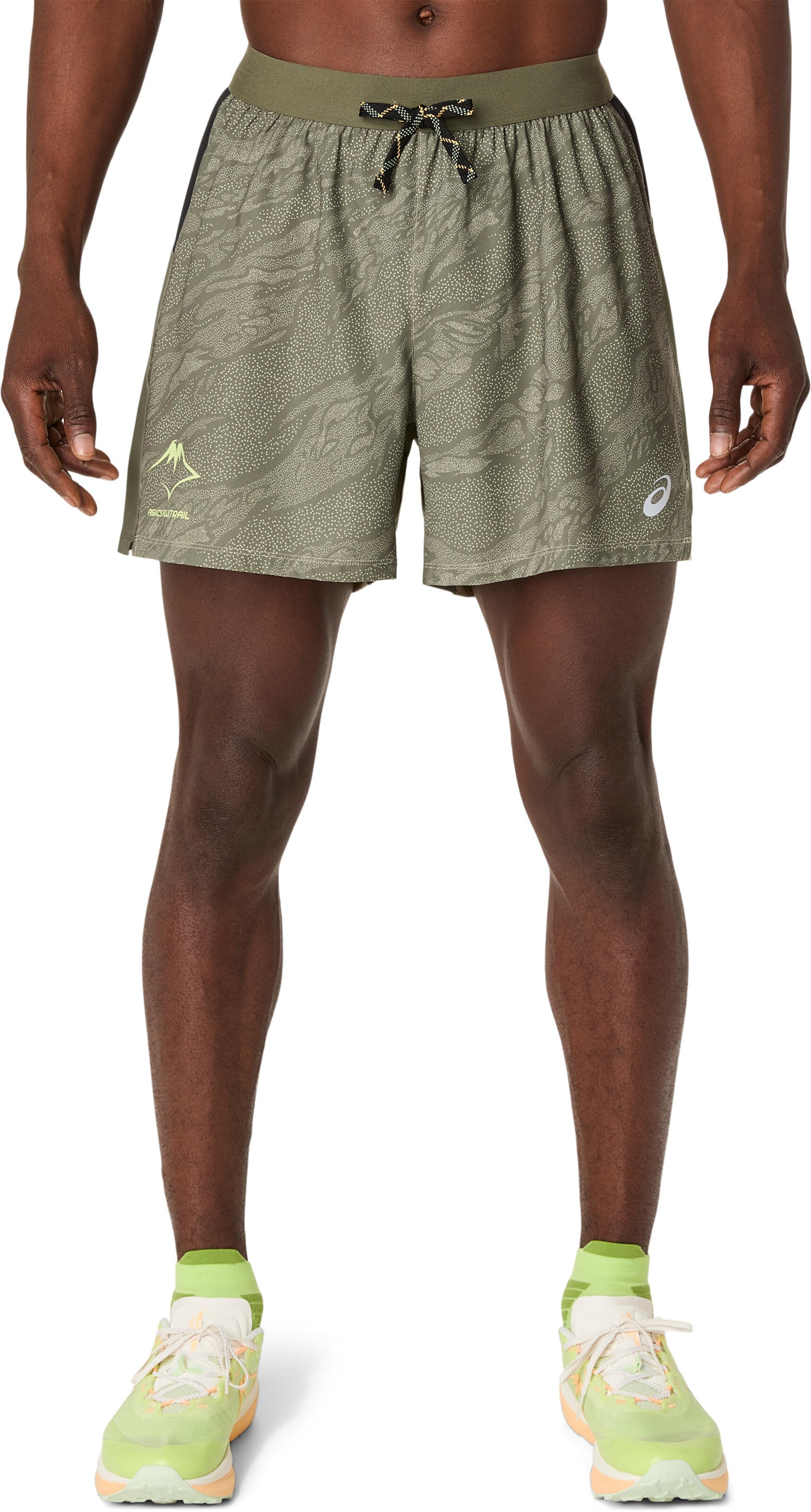 ASICS Regular Workout Pants in Green: front