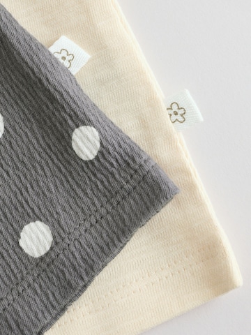 Next - Conjuntos em cinzento