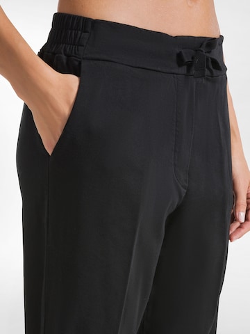 DEHA Slim fit Trousers in Black