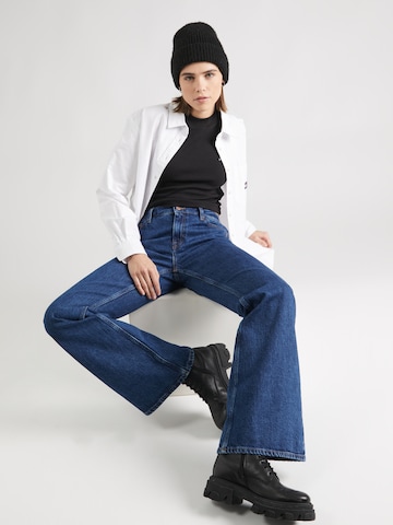 Tommy Jeans Bootcut Kavbojke | modra barva