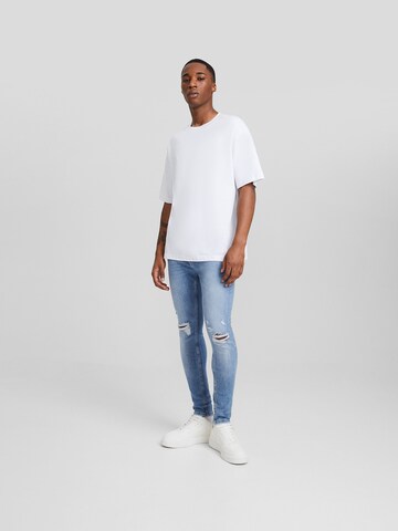 Bershka Skinny Jeans in Blau