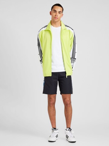 ADIDAS ORIGINALS Φθινοπωρινό και ανοιξιάτικο μπουφάν 'Megabreak' σε κίτρινο