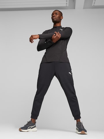 Effilé Pantalon de sport PUMA en noir