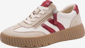 Baskets basses Tamaris en beige : devant