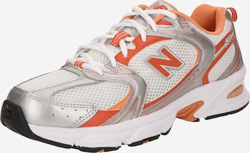 new balance Platform trainers 530 in Dark Orange ABOUT YOU