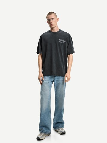 T-Shirt 'SURREAL' Bershka en noir