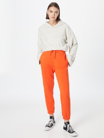 PIECES Tapered Hose 'Chilli' in Orange