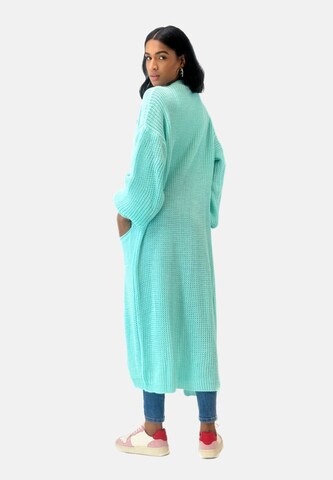 Manteau en tricot Elara en vert